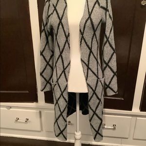 Gray and Black cardigan sweater.